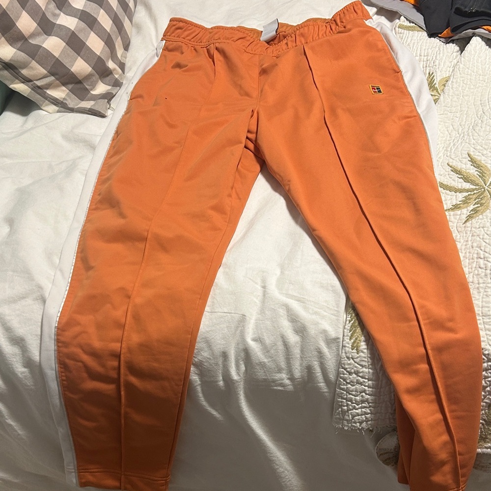 Nike Men's Orange Sweatpants with White Stripe